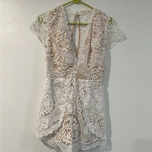 Boutique lace romper with beautiful detailing